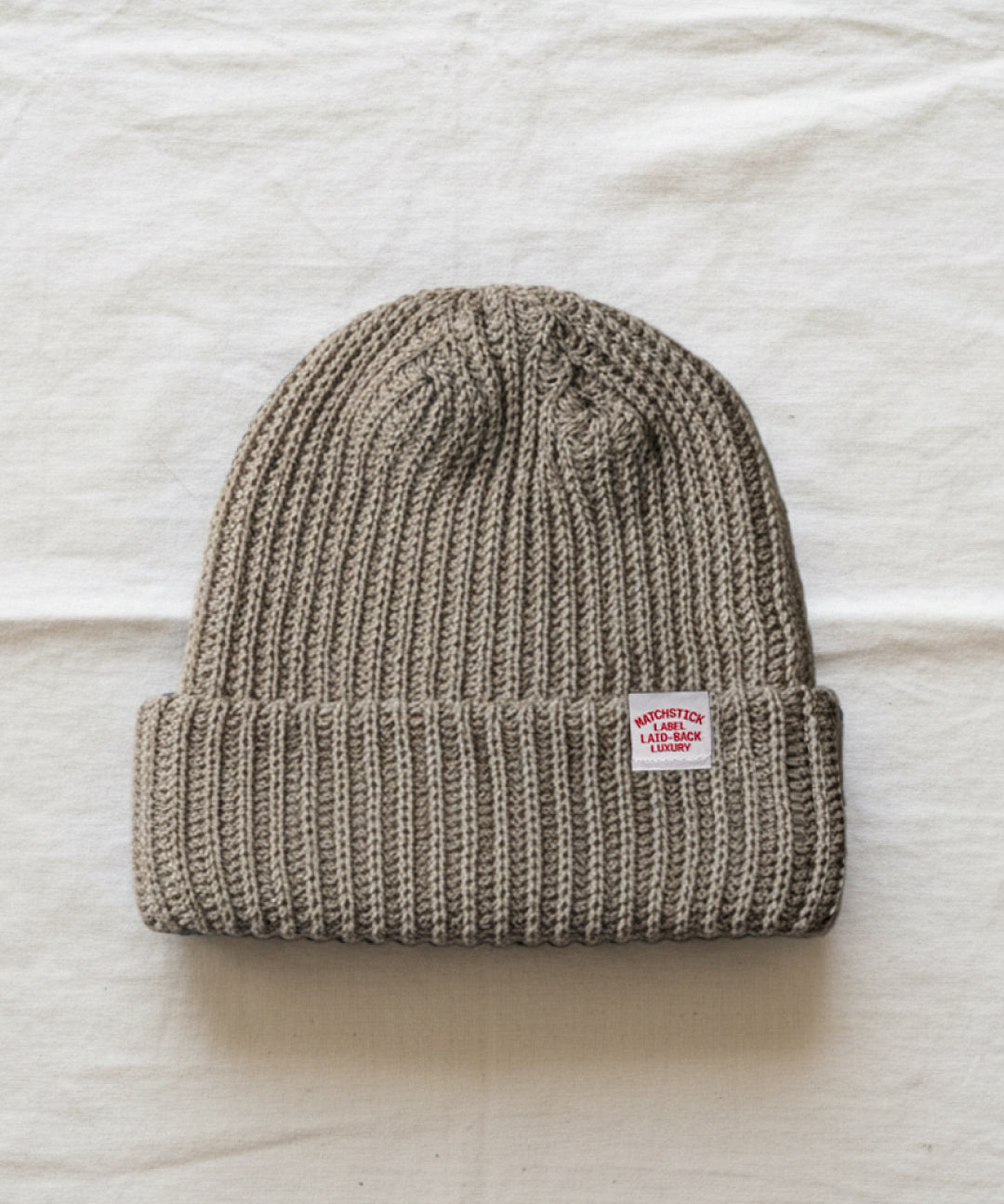 Matchstick-Lodge-Beanie-Truffle_b1324611-df8f-453e-bee7-fc4ba7bde76d.jpg